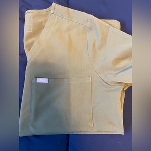 Figs uniform. Top is in new condition. Pants have small hole